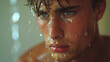 Intense portrait of a wet man with water droplets on his face
