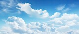 Fototapeta  - Serene Blue Sky With Soft White Clouds - Tranquil Day in Nature's Embrace