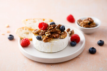 Sticker - Baked camembert cheese with nuts and berries