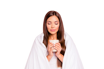 Poster - Autumn melancholy. Portrait of young smiling lady wrapped in blanket, drinking coffee. Isolated over pink pastel background