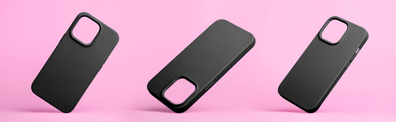 Poster - set of three smart phones in black silicone case falling down in different angles, back view isolated on grey background, phone case mockup