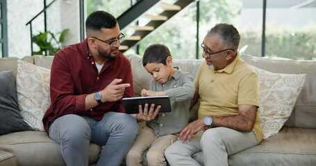 Canvas Print - Grandfather, dad and son with tablet on sofa in living room of home together for visit. Family, technology or social media app with senior man, parent and grandson in apartment for education or game