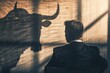 A focused investor with a bull shadow contemplating bitcoin strategies