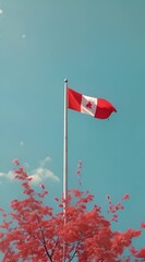 Wall Mural - Canada flag on clear blue sky 4K Video