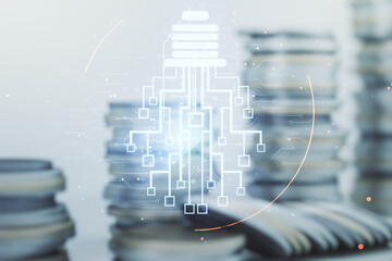Poster - Virtual creative light bulb with chip hologram on growing coins stacks background, artificial Intelligence and neural networks concept. Multiexposure