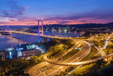 Fototapeta Przestrzenne - Tsing Ma Bridge in Hong Kong city at dusk