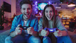 Two smiling children, a boy and a girl, play a video game with joystick together, joy filling their faces.