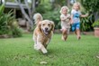 Two children and a golden retriever dog joyfully running in the green grass on a sunny day.