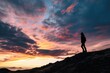 © PixelPioneerX - the silhouette of a person standing on a hill, surrounded by a breathtaking sunset, with the colorful sky and clouds dominating the frame