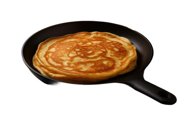 A Pancake Cooking in a Skillet. A pancake batter being cooked in a hot skillet on a stovetop. The pancake is starting to bubble and brown on the bottom side indicating it is almost ready to eat.