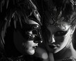 world of mystery and allure with this black and white portrayal of a masquerade ball. Against a backdrop of dramatic shadows