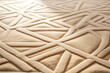 Close-up of a beige wool rug with a subtle geometric pattern, its texture invitingly soft underfoot. Sunlight creates a warm glow on the surface.
