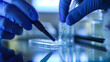 © Kateryna - A clinician preparing a smear test, applying a sample onto a glass slide for microscopic examination, Analyzing samples concept, Medical Research, Education, Medical Test, with cop