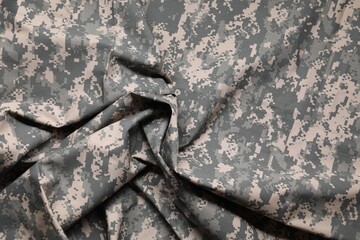 Poster - Texture of crumpled camouflage fabric as background, top view