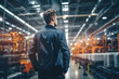 Industrial engineer overseeing production: Managing the operation of machinery and ensuring efficiency and safety standards are met in a busy manufacturing environment.