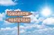 © Philip - Tomorrow or yesterday road sign on sky background business concept.