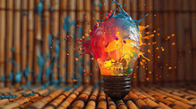 Yellow Paint Splash On Light Bulb 3D Illustration Glowing Glass Bulb Art Symbol With Background , Copy Space For Text , Artistic Colourful Explosion Of Paint Energy, Productivity And Creativity