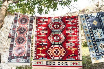 Wall Mural - Kruja old bazar with traditional carpet in  Albania 