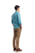 rear view of relaxed casual man wearing blue shirt