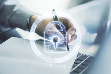 Poster - Creative lock sketch with chip hologram and hand writing in notepad on background with laptop, protection of personal data concept. Multiexposure
