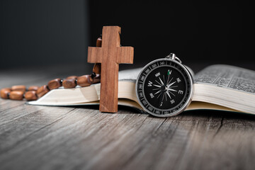 Sticker - Open Bible on wooden table, compass on it and wooden cross, word of God as guidance concept