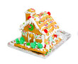 Homrmade ugly  gingerbread house   om white background