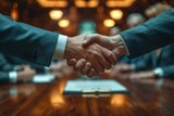 Fototapeta Miasto - Professional partners shake hands, closing deal in workspace