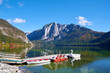 Great view of Mountains above Altaussee lake. Dramatic and picturesque scene with Boat. Location place Austria alps, Altaussee, Europe.