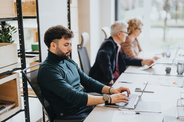 Poster - A group of attentive people participating in a serious business meeting in a contemporary office setting, showcasing teamwork and collaboration.