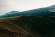 © Jimena Roquero/Stocksy - Beautiful landscape of Mount Etna in Sicily with group of tourists