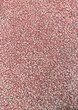 Close-up textured red background of rubber running track