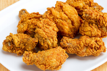 Canvas Print - Fried chicken isolated on white background.