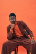 © Elena Kharichkina/Stocksy - Stylish black man in sunglasses