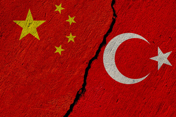 china and turkey flags painted over cracked concrete wall