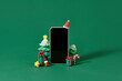 © Marc Tran/Stocksy - Smart phone mock up with Christmas realistic
