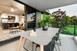 © IMAGE SUPPLY/Stocksy - Outdoor Terrace Setting in Modern Home