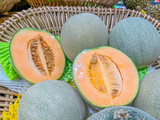 Fototapeta Tulipany - Closeup of cantaloupe melon in the basket in the market