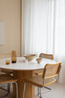 © Artem Podrez/Stocksy - A modern dining room with stylish furniture