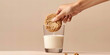 Delicious Homemade Cookie Dunked Into Creamy Milk Glass Banner