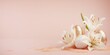 Elegant Easter background with glittery and speckled eggs nestled among pristine white lilies on a soft pink backdrop with ample copy space