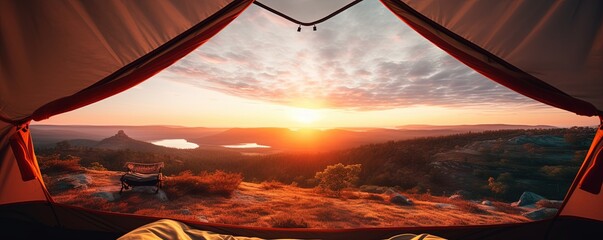 Poster - View of the serene landscape from inside a tent. Camping at campsite with sleeping bags. Stunning sunrise