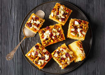 Poster - slices of yogurt cake with nuts and dried berries