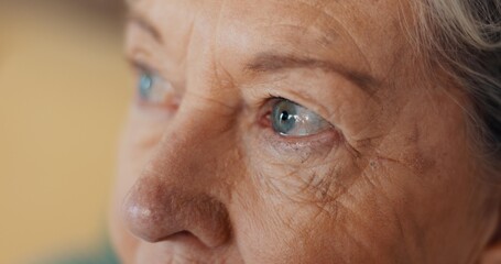 Eyes, thinking and senior woman at nursing home with fear, stress and worry or depression in closeup. Anxiety, face and elderly lady with nostalgia, doubt and dementia for memory loss or Alzheimer