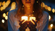 Pretty brunette woman holding two candles outdoor at night - AI Generated