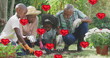 Image of heart balloons over african american family gardening plants