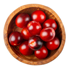 Wall Mural - Black cherry tomatoes in wooden bowl isolated on white. Kumato tomatoes. Top view.