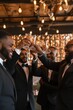 © Giantdesign - Professional Photography of The Groomsmen Raising a Toast to The Groom, Generative AI