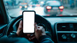 © henjon - Smartphone with cut out blank screen held in car, driving, and texting concept.