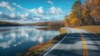 Lakeside Drive: A road stretching along the lakeside, with shadows of trees on one side and clouds reflecting in the calm waters, providing a tranquil lakeside driving experience. 