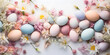 easter eggs and flowers Colorful easter eggs and spring flowers background. Top view.